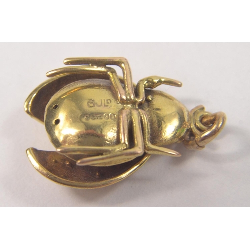 65 - 8 QUALITY 9ct gold charms to include a novelty one pound bank note, a set of 3 keys on a ring, A Noa... 