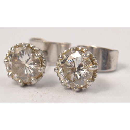 66 - STUNNING ! Pair of round brilliant solitaire diamond studs, total weight of diamonds approx 1.60ct, ... 