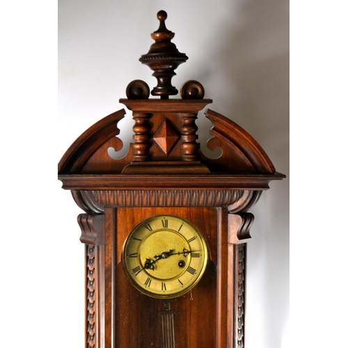 89 - Antique German Vienna style wall clock with Roman numeral dial (W: 13cm) and carved edges and 4 finn... 