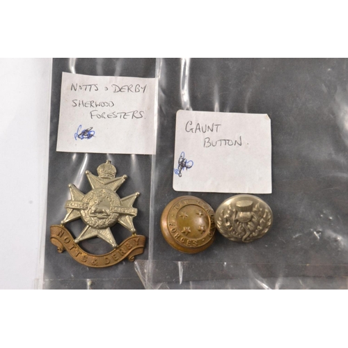 91 - A vintage collection of mainly military badges, KOSB George V1 39/45 service medal, Royal signals ba... 