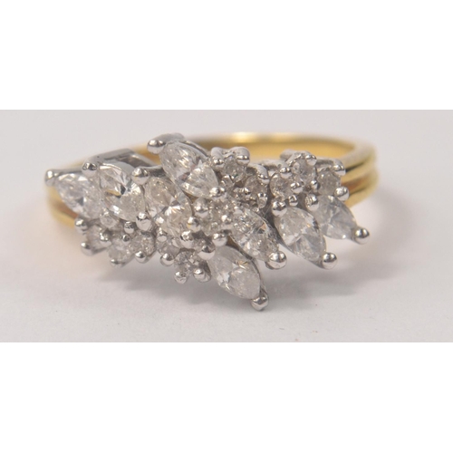 1 - Ladies Hallmarked 750 gold and multi diamond ring, 8 larger marquise cut and the rest smaller suppor... 