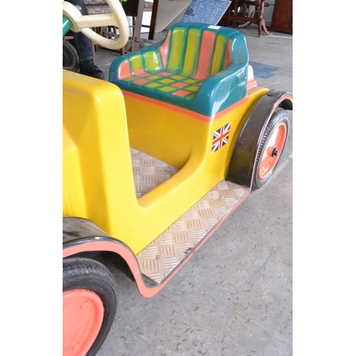 239 - RARE TO FIND! A FAIR GROUND 'STANDARD TRIUMPH' ride-on merry go round fibre glass car in good condit... 