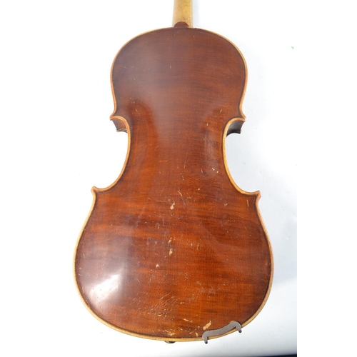 246 - A very old violin in it's case with accessories, and 2 bows!