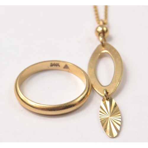 31 - A 10k stamped gold necklace with oval shaped pendant(s) Length 25.5cm end to end weight 2,70g and a ... 