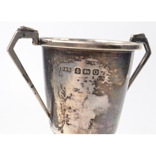 59 - Small Birmingham hallmarked silver trophy(30.10g weight with trophy stand Height 9cm and a silver ha... 