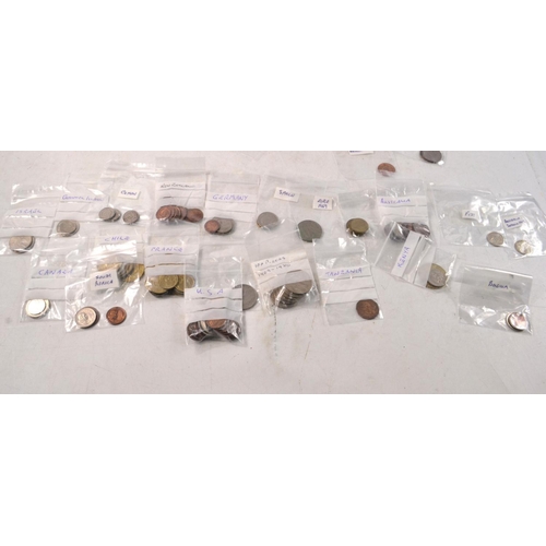 26 - A large selection of British and World coins with list within, to include a large quantity of penny'... 