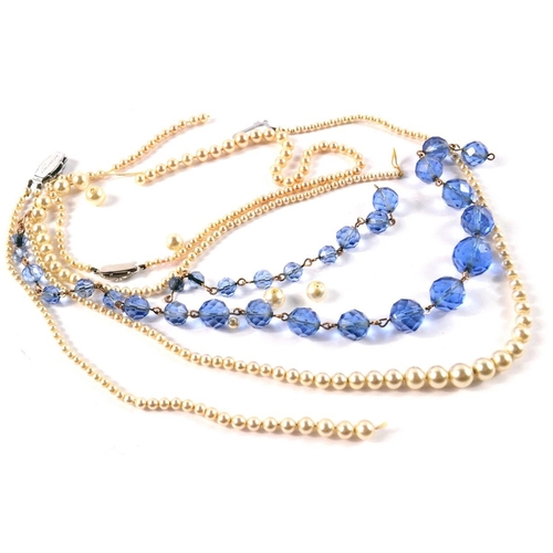 42 - Vintage string of blue graduated faceted beads 42 cm longTwo strings of graduated faux pearls