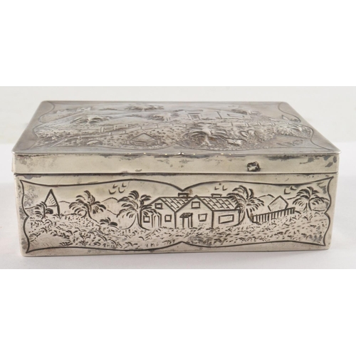 103 - Embossed London silver cigarette box depicting rural scene with castle and houses