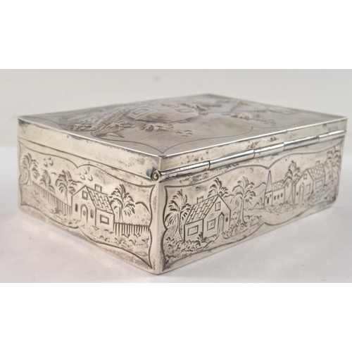 103 - Embossed London silver cigarette box depicting rural scene with castle and houses