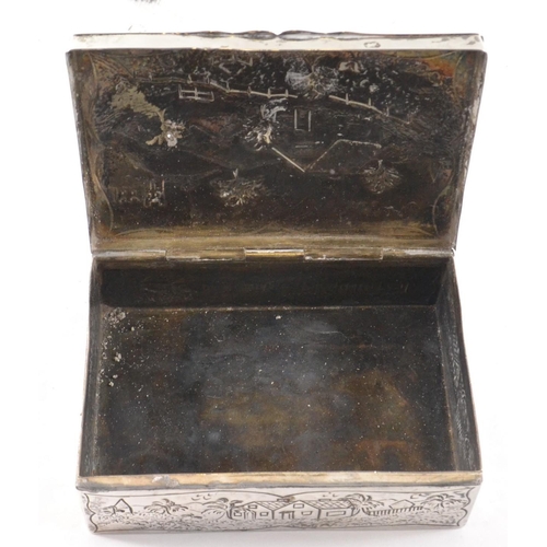 103 - Embossed London silver cigarette box depicting rural scene with castle and houses