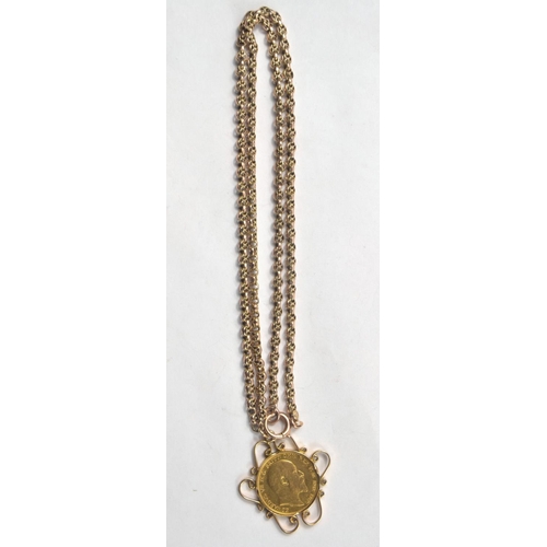 135 - Full Edward V11 1907 gold Sovereign, mounted, with a quality guard 9ct stamped gold chain, chain mea... 