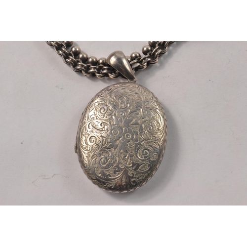 143 - Victorian silver locket with chain. 925 Silver [ not marked but tested]