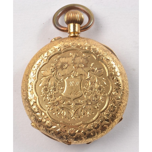 153 - CEdwardian 18kt stamped gold cased ladies antique pocket watch 3.5cm diameter with an ornately decor... 