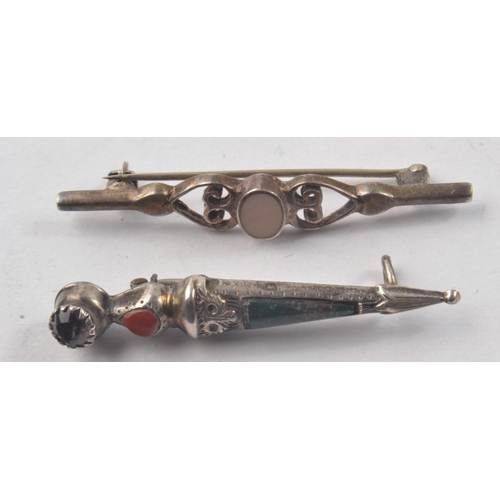 167 - Four pin brooches.  Pin brooch white metal with a pinkish coloured stone 6cm Length, an UNUSUAL Scot... 