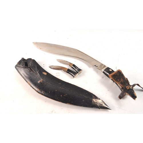 173 - KHUKRI knife with sheath and 2 smaller knives within sheath blade length 31cm, full knife incl handl... 