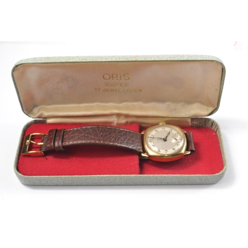 23 - 9ct gold CYMA wrist watch with leather strap and second dial. Movement working at time of entry