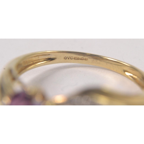 29 - 9ct Yellow gold ring set with 5 marquise cut Amethysts and diamond shoulders. Size Q [2.3grms]