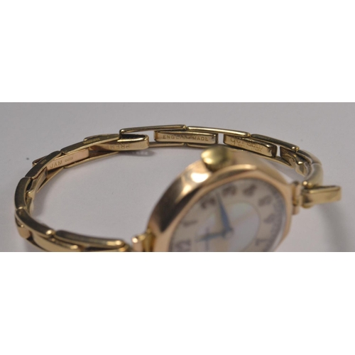 3 - Vintage 375 stamped case MEDINA ladies wrist watch with gold lined expanding wrist band