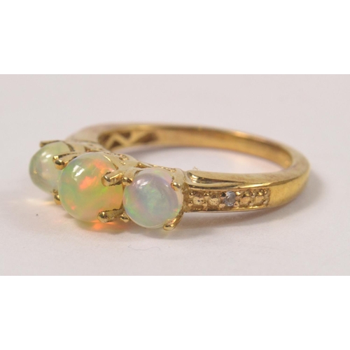 30 - Gilded 925 stamped ring set with 3 graduated pale green stones Size P