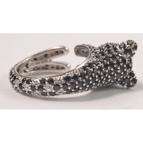 43 - 925 Silver stamped ring, designed as a cat set with black CZ stones. Size P