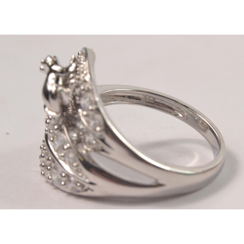 46 - 925 Silver stamped ring designed as two CZ stone set leaves with a small frog sat on one Size Q