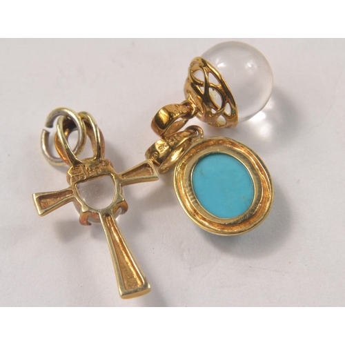 50 - 3 9ct Yellow gold pendants 1; cross set with clear stone 2; clear stone ball 3; oval torquoise style... 