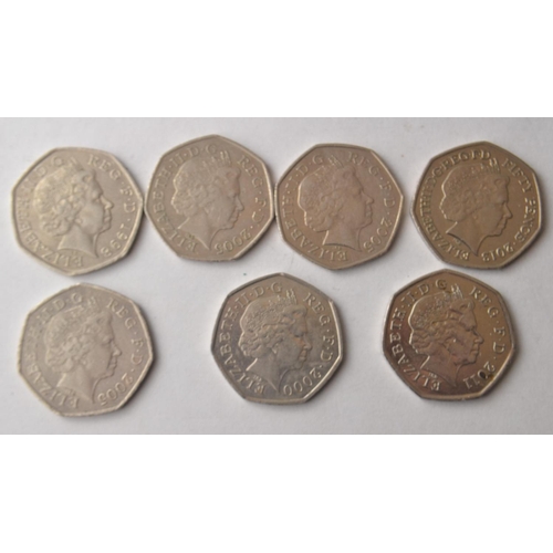 82 - A collection of 7 fifty pence pieces to include 3 coins described as a Rare 50p Fifty Pence Coin Jo... 