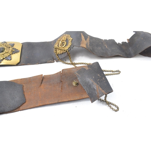 109 - Very old Military belt with 'Now or Never' motto and 3 in trumpet emblem, with matching musket ball ... 