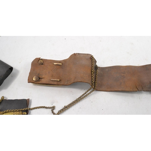 109 - Very old Military belt with 'Now or Never' motto and 3 in trumpet emblem, with matching musket ball ... 