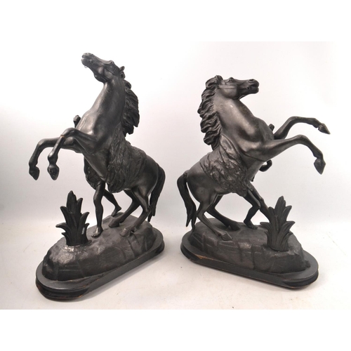 117 - Pair of rearing horse metal statues