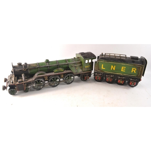 132 - Vintage tin plate Flying Scotsman model and LNER carriage tender