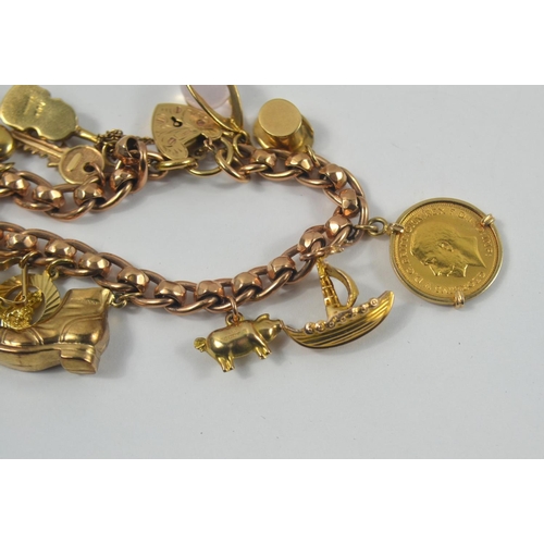 160 - A nice gold charm bracelet, filled with charms. Chain is 375 stamped gold with 12 charms, one a moun... 