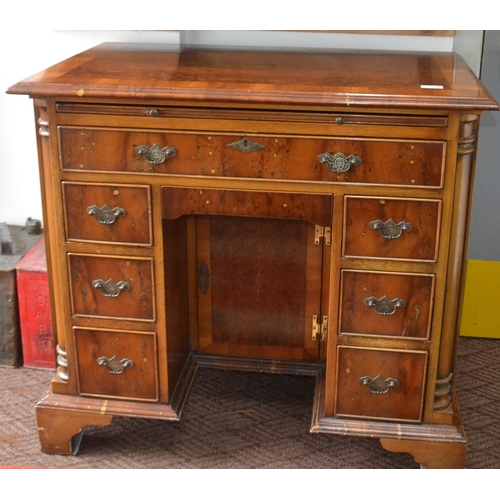 338 - Excellent quality Antique style walnut and Yew trim writing desk one over six drawers, with a pull o... 