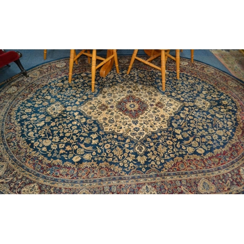 341 - Large oval rug good quality highly decorative with exotic birds etc with pattern- purchased for £500... 