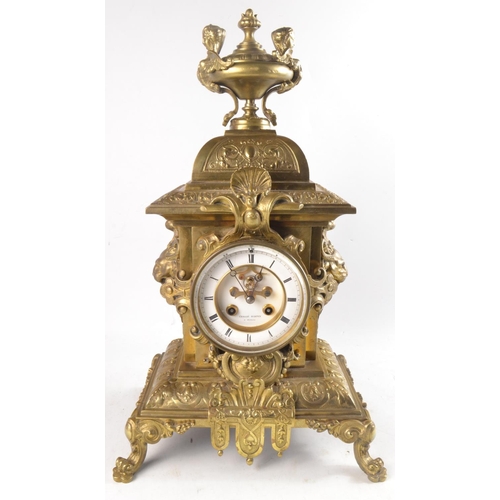 342 - 19th Century brass mantle clock with enamel dial and scrolling and leaf decoration by Challie Burtey