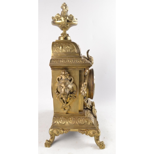 342 - 19th Century brass mantle clock with enamel dial and scrolling and leaf decoration by Challie Burtey