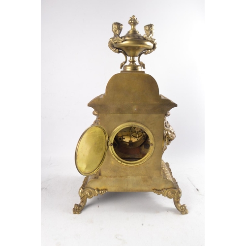 342 - 19th Century brass mantle clock with enamel dial and scrolling and leaf decoration by Challie Burtey