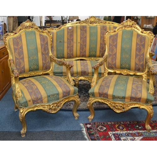 349 - Fabulous pair of Georgian Inspired  gilt and striped fabric armchairs with carved  detailed gilt tri... 