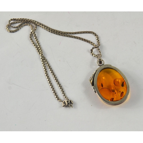 41 - A 925 stamped silver ART NOUVEAU inspired brooch on a 925 stamped silver chain with a large  amber s... 