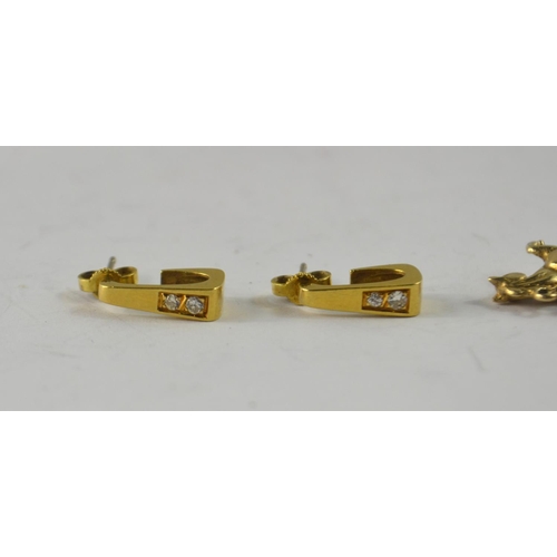 42 - Quality South African yellow metal stud earrings with two small diamonds ( tested) set in each ear... 