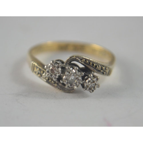 46 - 9ct and platinum ring set with 3 illusion set diamonds and marquise shoulder.