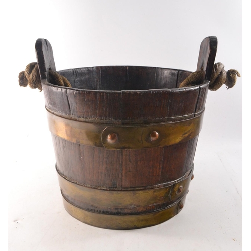 58 - Nice quality antique oak bucket with brass trim and a rope handle - nice example