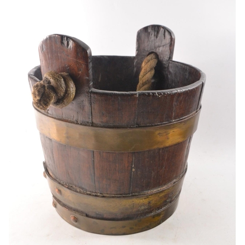 58 - Nice quality antique oak bucket with brass trim and a rope handle - nice example