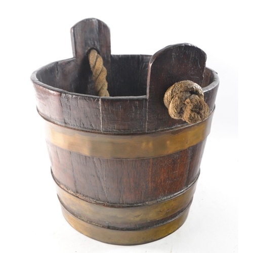 58 - Nice quality antique oak bucket with brass trim and a rope handle - nice example