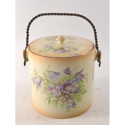 59 - Antique ceramic biscuit barrel with brass handle