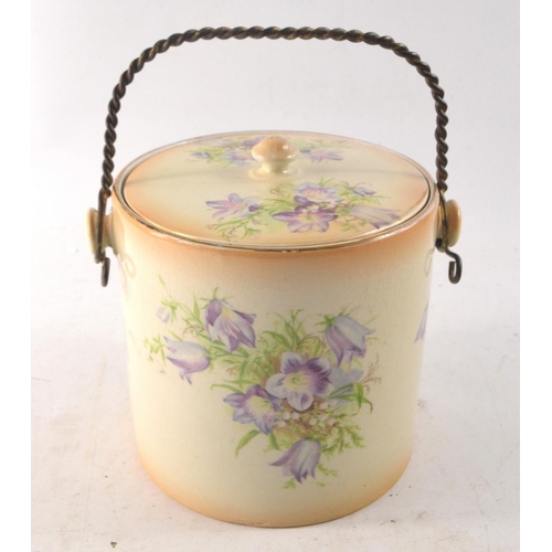 59 - Antique ceramic biscuit barrel with brass handle