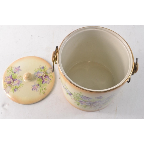 59 - Antique ceramic biscuit barrel with brass handle