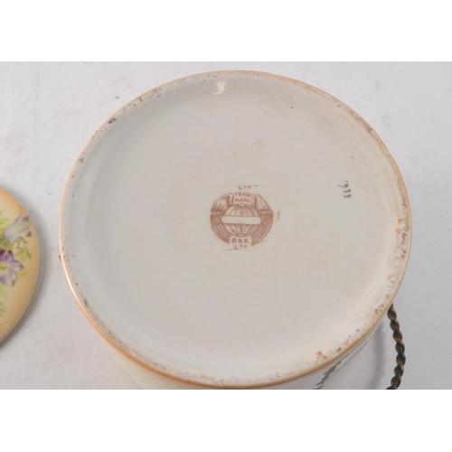 59 - Antique ceramic biscuit barrel with brass handle