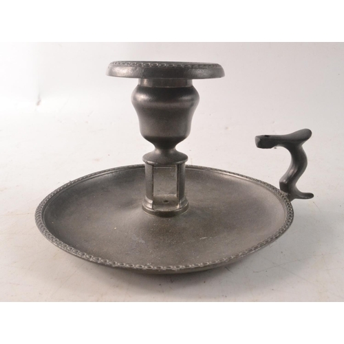 60 - Old pewter candle holder and a pair of candle snuffs