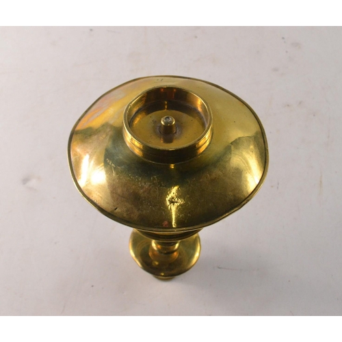 63 - A Victorian brass candle and match holder